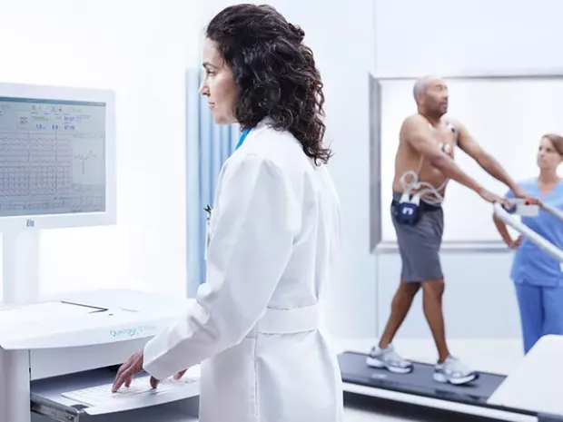 Physician conducing a stress test with Q-Stress