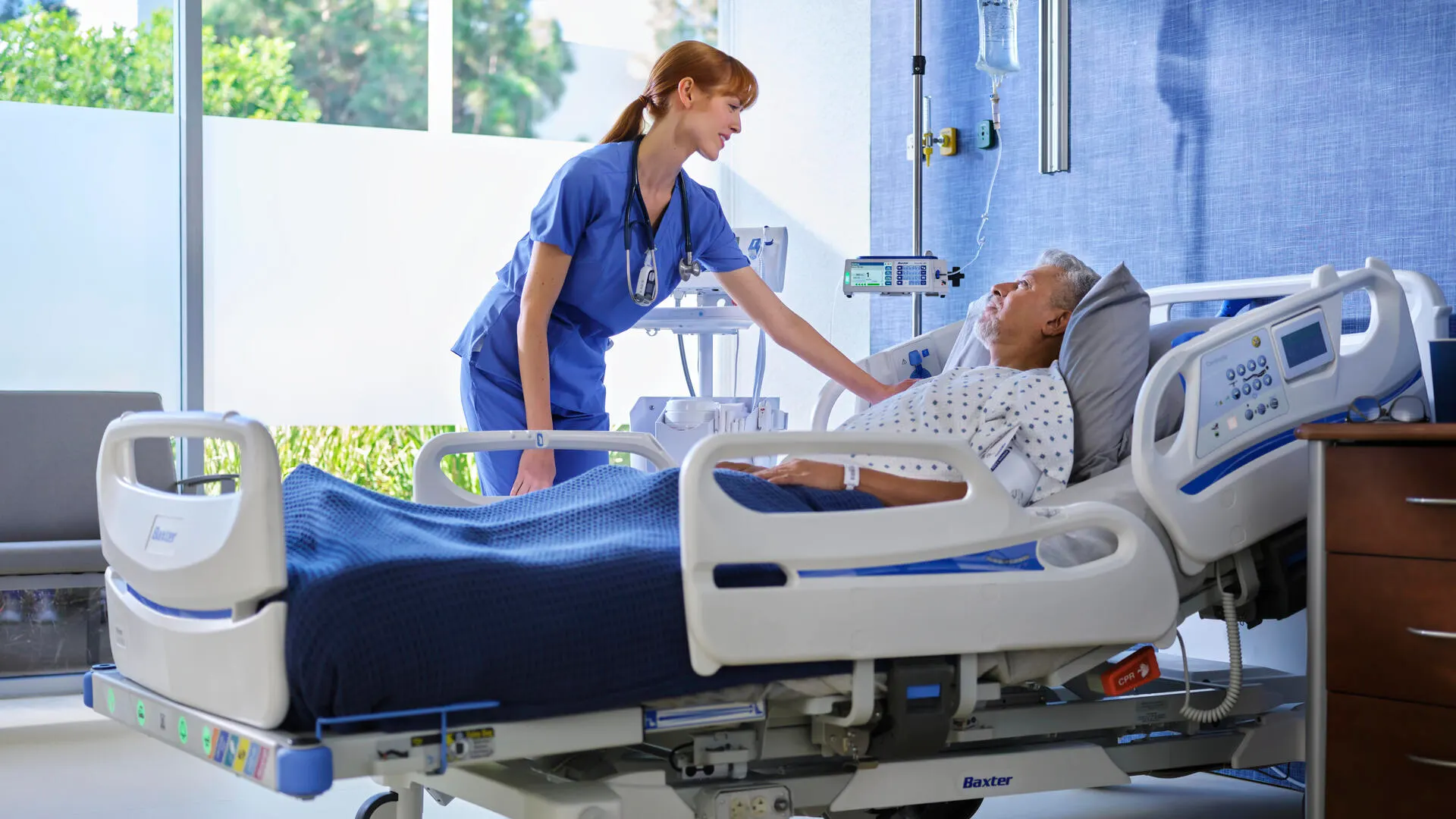 Healtcare profesional smiling reassuringly at patient