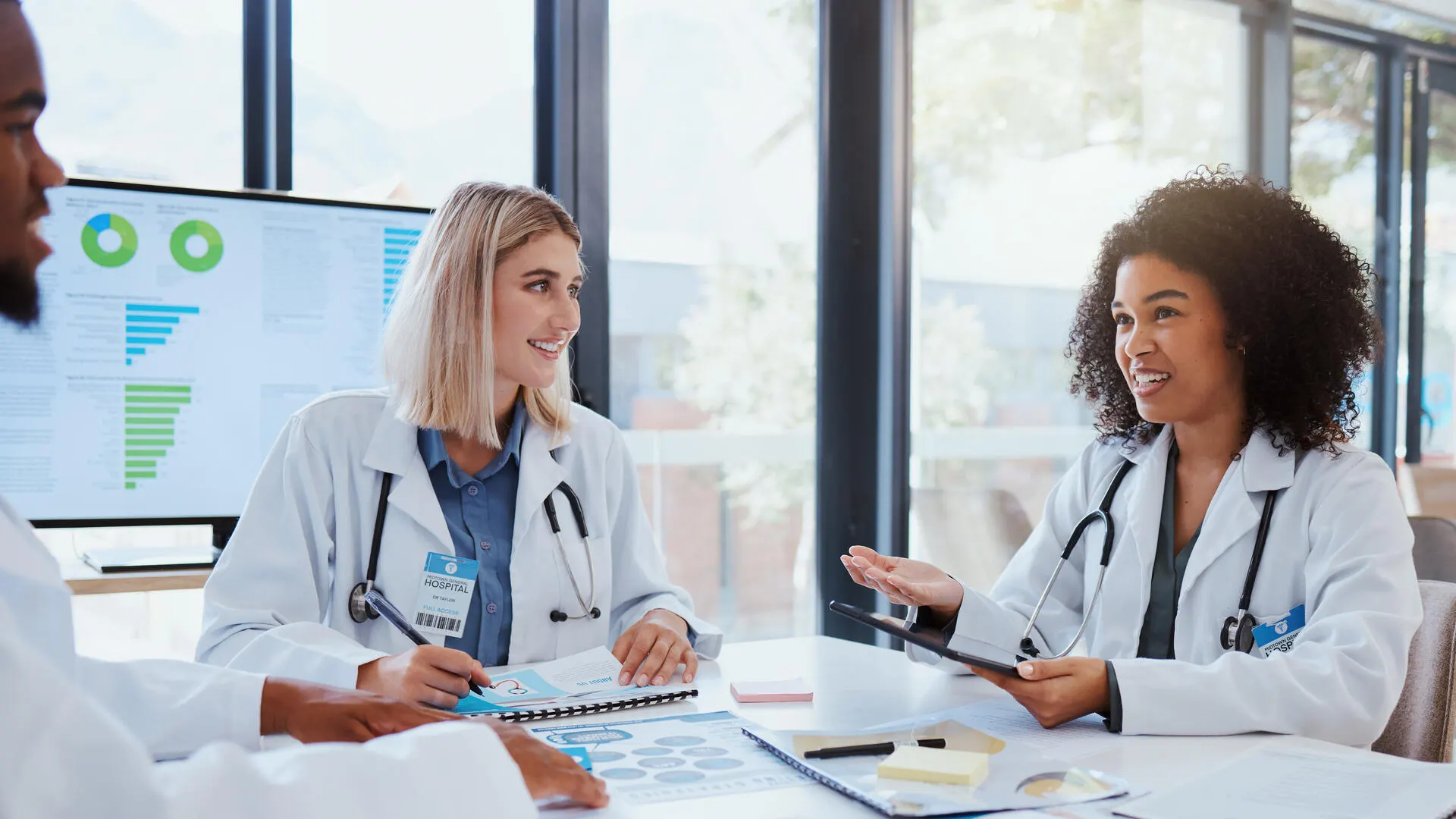 Healthcare profesionals discussing solutions