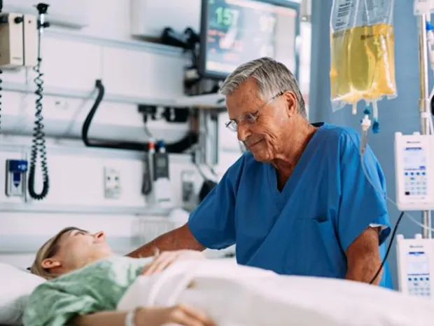 Healthcare worker comforts a pediatric nutrition patient
